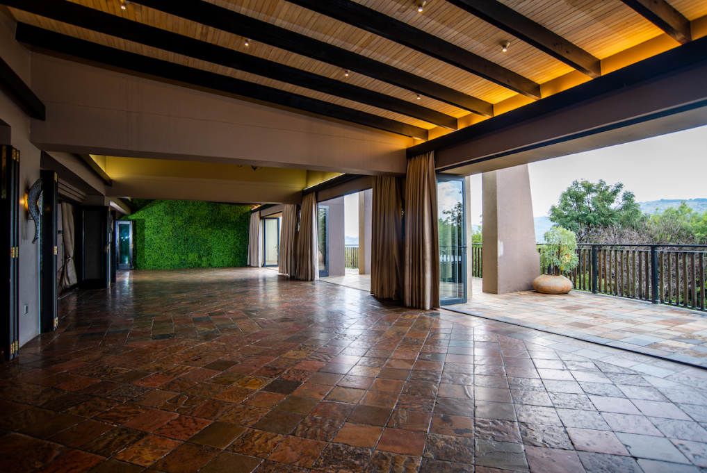 Lolola Hall 02 1017 x 681 - Thaba Eco Hotel The view from Lolola hall on to Thaba Eco Hotel, with high ceiling and a chandelier